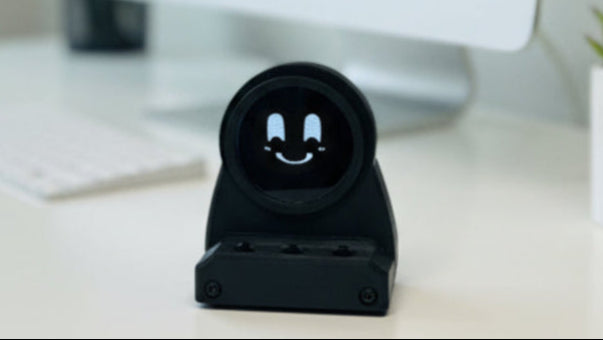 DeskOrbie product on a desk with a computer monitor in the background