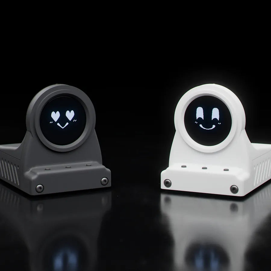 Charcoal Black and Frost White DeskOrbie 2 showing Orbie's heart eyes and smile